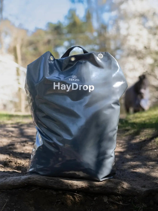HayDrop bag with a horse in the background